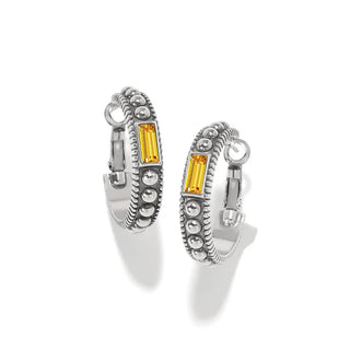 Silver hoop earrings with yellow gemstones on a white background. Brighton Pretty Tough Gem Hoop Earrings in Light Topaz