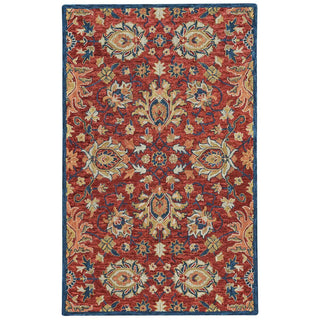 A traditional red and navy wool rug with a floral pattern and a border in navy color.