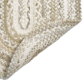 Capel Bayview Oval Rug in Linen 8' x 11'
Close-up of a textured beige and white rug corner braided