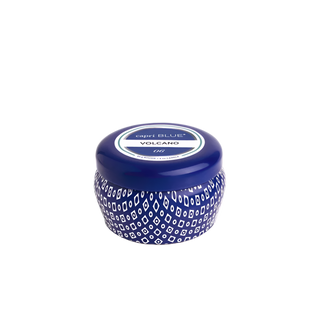 A compact blue mini tin with a white geometric pattern and 'VOLCANO' printed on the top.