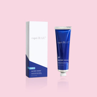 Capri Blue Watery Moon Hand Cream next to the signature blue and white box