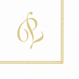 A white cocktail napkin with golden hemstitching and a script initial design.