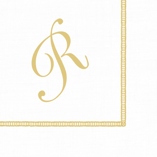 A white cocktail napkin with a hemstitch design and a printed golden initial 'R' in the corner.