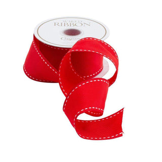 A roll of red grosgrain ribbon with a label that reads 'Caspari' and 'Grosgrain Ribbon'.