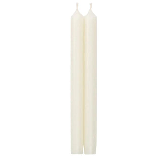 A pair of white, straight taper candles, 12 inches long, made with a paraffin and palm wax blend and lead-free cotton wicks, packaged in cellophane.