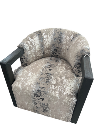 Burton James decorative armchair with patterned fabric and dark brown wood frame on a white background