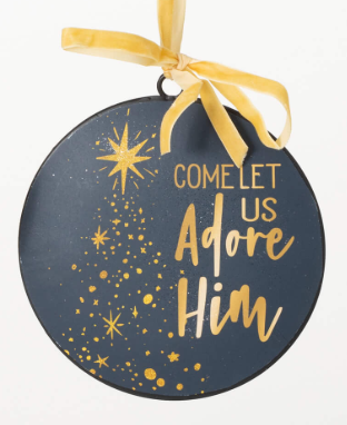 Decorative ornament with 'Come Let Us Adore Him' text and star designs on a dark background.