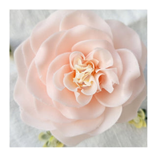 A close-up image of a pink petite soap flower with a soft background. Cherry Blossom Petite Soap Flower