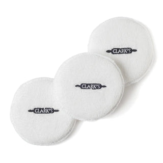 Three white buffing pads with 'Clark's' brand logo printed in the center. Clark's Buffing Pads