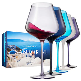 A set of five colored wine glasses in blue, clear, white, and purple, with a clear stem and base, filled with liquid next to the product box.