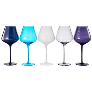 A set of five colored wine glasses in blue, clear, white, and purple, with a clear stem and base, filled with liquid.