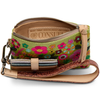 Consuela wristlet with green sparkly background and multicolored embroidered flowers
