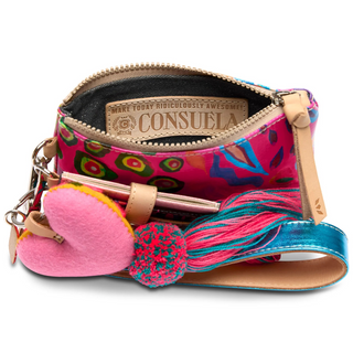 A colorful wristlet wallet with a floral pattern, featuring a leather strap, a tassel, and a charm.