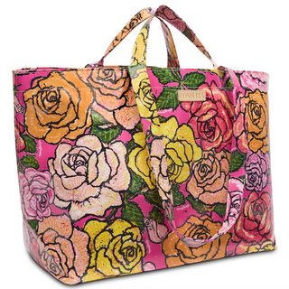 A multicolored floral tote bag with short and long handles