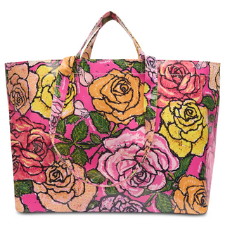 A multicolored floral tote bag with short and long handles