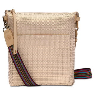 A champagne woven textured leather crossbody bag with a multicolor strap, front slip pocket, and side zip pocket.