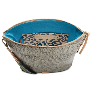 A Consuela Hobo bag with a gold and black metallic dotted pattern and a woven multicolored crossbody strap.