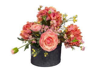 coral & pink arrangement in tin container hydrangea ranunculus yellow baby's breath berries rananculus cherry blossom