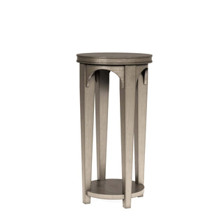A small round gray accent table with four elegantly tapered legs and a round stretcher. Cove Spot Table