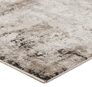 Denizi DZ2 Putty 7'10"x10' Rug 8x10 A close-up image of a textured beige and gray area rug with a distressed design.