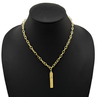 Gold chain necklace with a cross on the pendant 