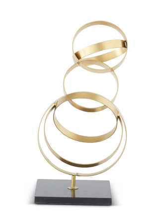 Gold Metal Loops Sculpture on Black Metal Base modern sleek