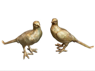Gold Resin Pheasant Assorted distress
A pair of metallic gold bird figurines shaped like pheasants