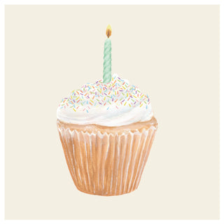 Birthday cupcake with white frosting, colorful sprinkles, and a single candle on a beige cocktail napkin. Hester & Cook Cupcake Cocktail Napkins