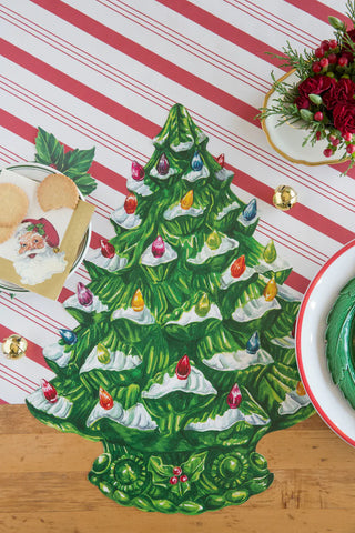 Hester & Cook Die-Cut Vintage Christmas Tree Placemat with red and white stripe paper table runner
