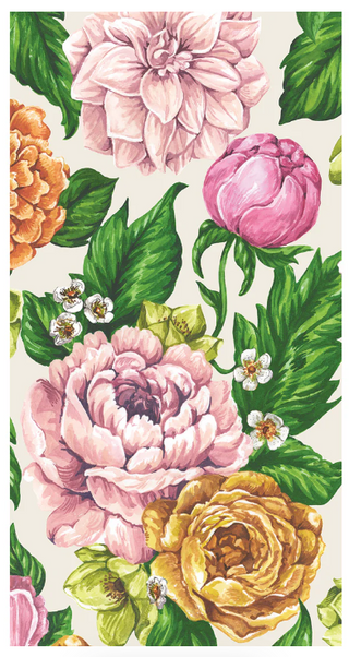 A folded paper napkin with a floral pattern featuring large flowers in shades of pink and yellow. Hester & Cook Garden Derby Guest Napkins