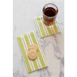 Green and white striped guest napkin on a marble background