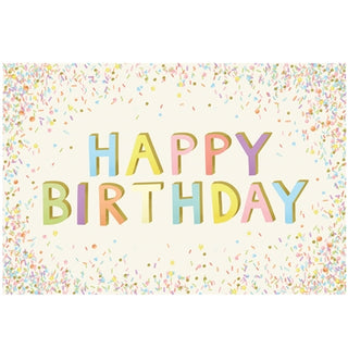 A festive Happy Birthday placemat with a colorful sprinkles design. Hester & Cook Happy Birthday Sprinkles Placemats