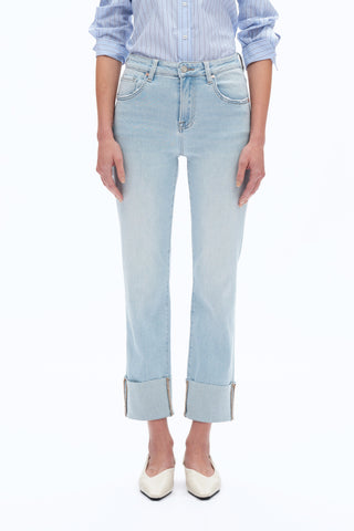 A pair of high-rise straight-leg jeans with a rolled hem in a light blue wash. The jeans are shown in a worn-in style with visible pockets and a zipper. Bayeas Jeans