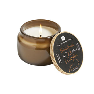 A brown jar with a wooden lid containing a bourbon scented candle, labeled 'Hillhouse Naturals Bourbon Candle'.