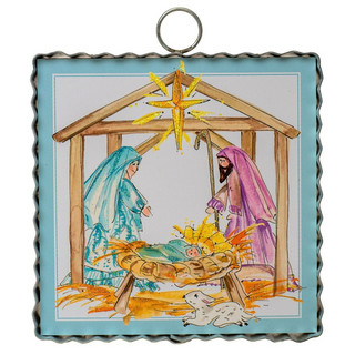Decorative nativity scene with Mary, Joseph, and baby Jesus in a manger, framed in blue. Holy Family Mini Metal Art
