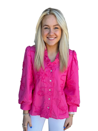 Woman in pink button up shirt