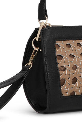 Black handbag with a geometric patterned front on a white background