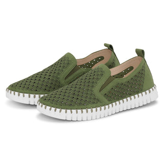 Green slip-on sneakers with white soles on a white background