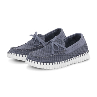 A pair of grey blue Ilse Jacobsen Tulip 3074 boat shoes with ties on the upper and a natural rubber outsole.