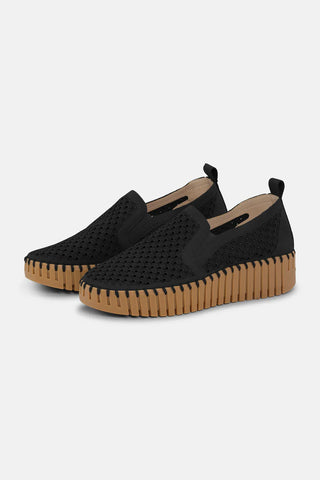 Black slip-on shoes with brown soles isle jacobsen 
