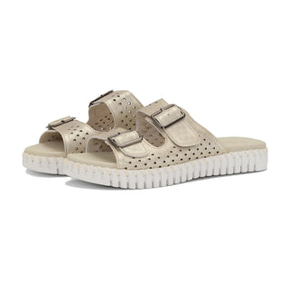 Beige sandals with white soles on a white background