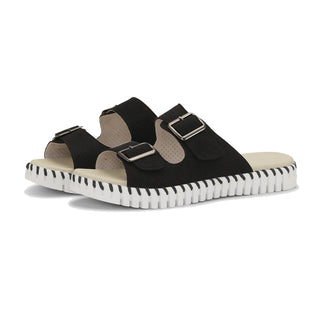 Black sandals with white sole on a white background