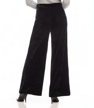 A pair of black crushed velvet pants with a high-rise waist and wide-leg design, featuring an elasticized waistband.