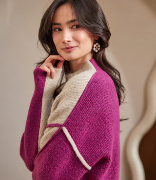 Woman wearing a purple and beige cardigan against a neutral background. Karen Kane Colorblock Mock Neck Sweater, Oatmeal with Orchid
