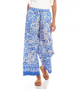 A pair of high-rise, blue floral paisley drawstring pants with wide-leg and elasticized waistband.