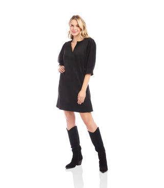 Woman wearing a black dress and knee-high boots on a white background. Karen Kane Faux Suede Puff Sleeve Dress, Black
