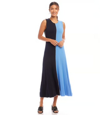 A sleeveless midi dress with color blocking in navy and blue, worn by a model standing against a white background.