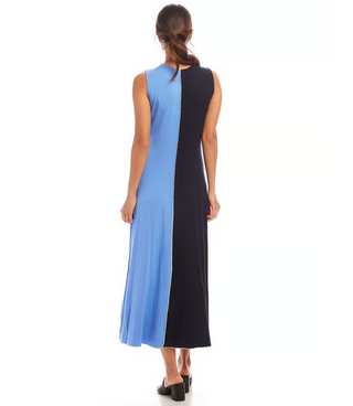 A sleeveless midi dress with color blocking in navy and blue, worn by a model standing against a white background.