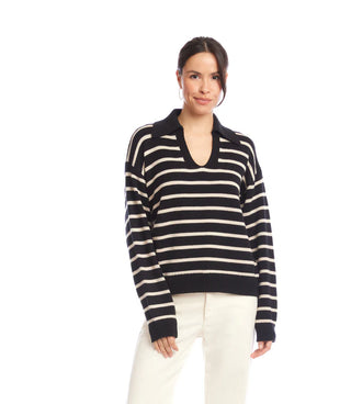 Woman wearing a black and white striped sweater on a white background. Karen Kane V Neck Stripe Polo Sweater, Black with Ecru
