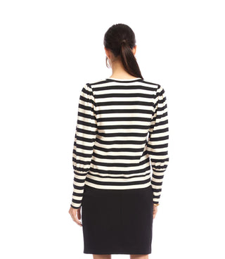 Person wearing a black and white striped sweater with a plain background. Karen Kane V-Neck Stripe Bishop Sleeve V-Neck Top, Black with Cream